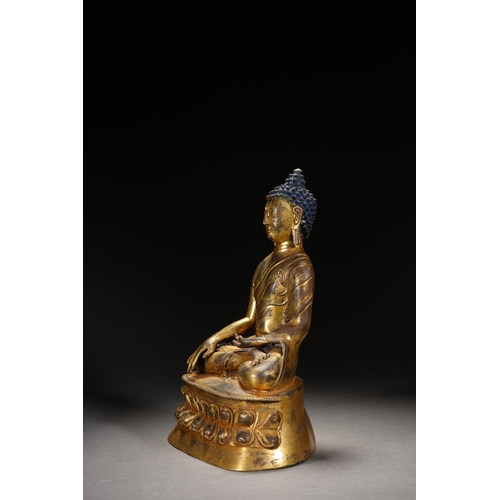 81 - A gilt bronze seated statue of Shakyamuni Buddha, Qing Dynasty 25cm high, 18cm wide