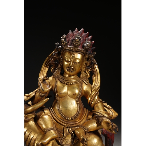 84 - A gilt bronze seated statue of Mahakala, Qing Dynasty 23cm high, 19cm wide