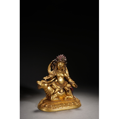 84 - A gilt bronze seated statue of Mahakala, Qing Dynasty 23cm high, 19cm wide