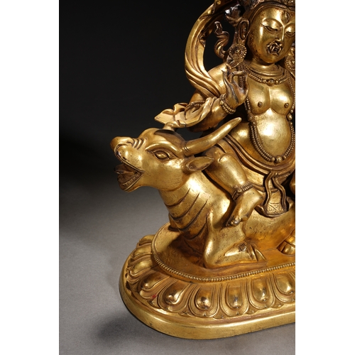 84 - A gilt bronze seated statue of Mahakala, Qing Dynasty 23cm high, 19cm wide