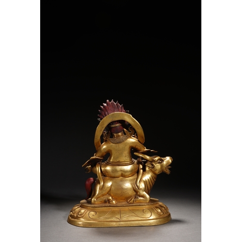 84 - A gilt bronze seated statue of Mahakala, Qing Dynasty 23cm high, 19cm wide