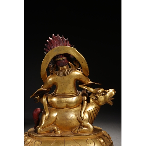 84 - A gilt bronze seated statue of Mahakala, Qing Dynasty 23cm high, 19cm wide