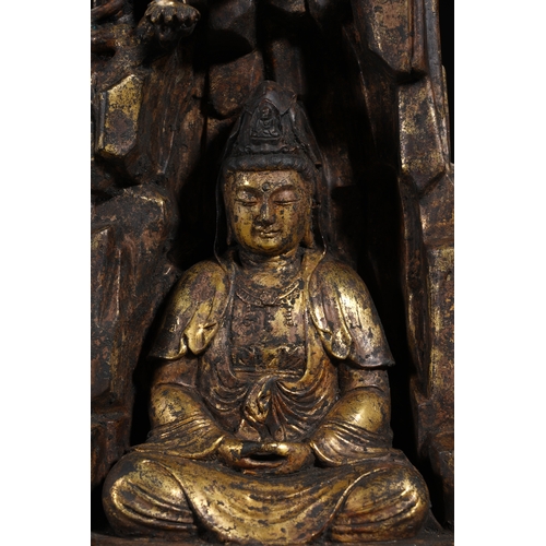 85 - A gilt bronze seated statue of Guanyin, Qing Dynasty 22.5cm high, 12.5cm wide