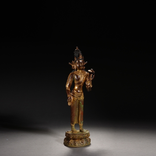 86 - A Nepalese-style bronze and gold lacquer standing Guanyin, Qing Dynasty 35.5cm high, 12cm wide... 