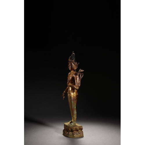 86 - A Nepalese-style bronze and gold lacquer standing Guanyin, Qing Dynasty 35.5cm high, 12cm wide... 