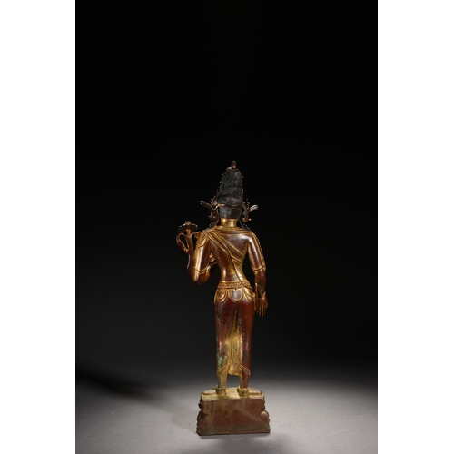 86 - A Nepalese-style bronze and gold lacquer standing Guanyin, Qing Dynasty 35.5cm high, 12cm wide... 