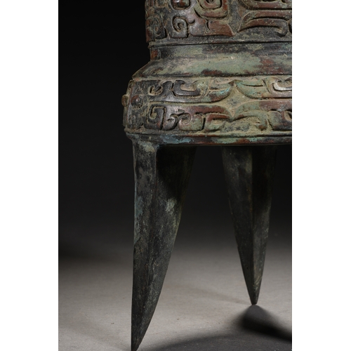 87 - A bronze vessel 28cm high, 15cm wide