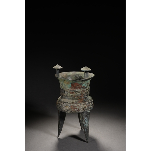 87 - A bronze vessel 28cm high, 15cm wide