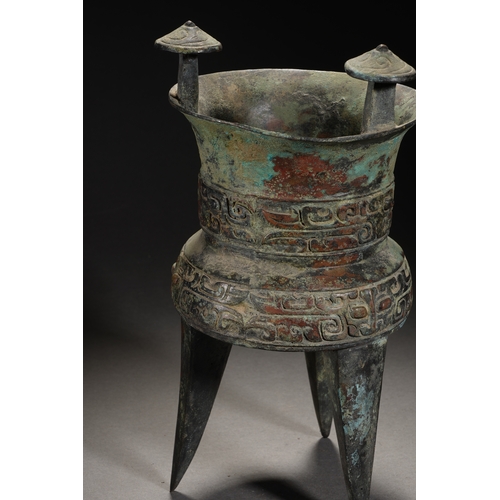 87 - A bronze vessel 28cm high, 15cm wide