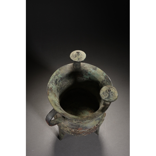 87 - A bronze vessel 28cm high, 15cm wide