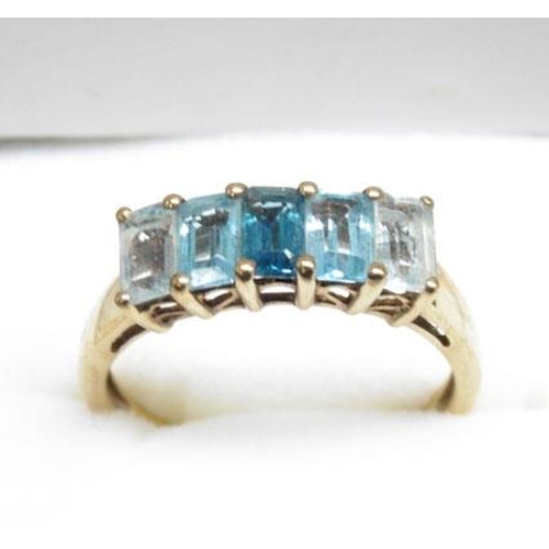 107 - 9ct gold multi coloured blue topaz ring - Size Q 1/2