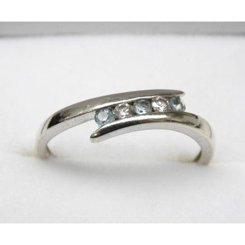 126 - 9ct white gold blue topaz ring