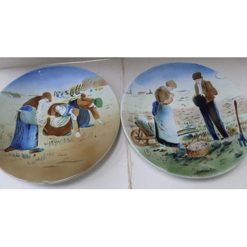 141 - Pair of large German hanging plates