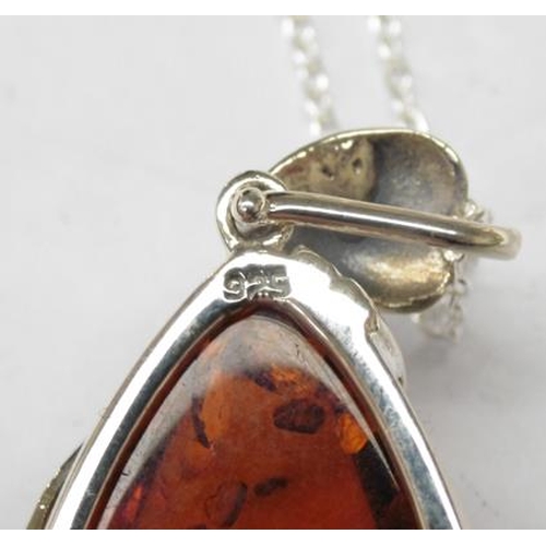 293 - Silver & amber pendant on silver chain