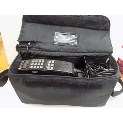 692 - Vntage Motorola phone with accessories in bag