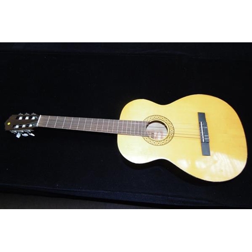 11 - One Musima guitar