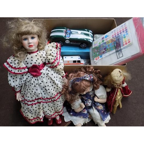 34 - Box of vintage games and toys incl. Diecast, Hornby train set, China headed dolls and Sindy