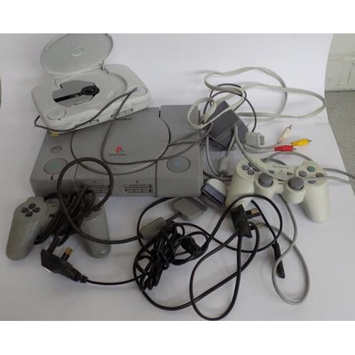 4 - 2 Sony Playstation, with attachments and controllers