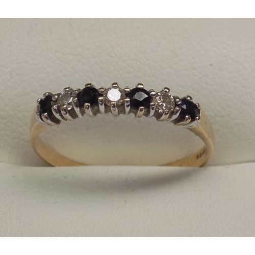 106 - 9ct gold sapphire half eternity ring, size O 1/4