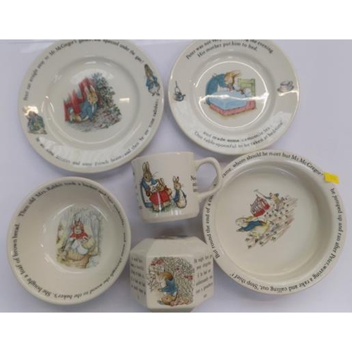 189 - Wedgewood Peter Rabbit plate x2, bowl, cup, money box and porridge bowl (slight chip)