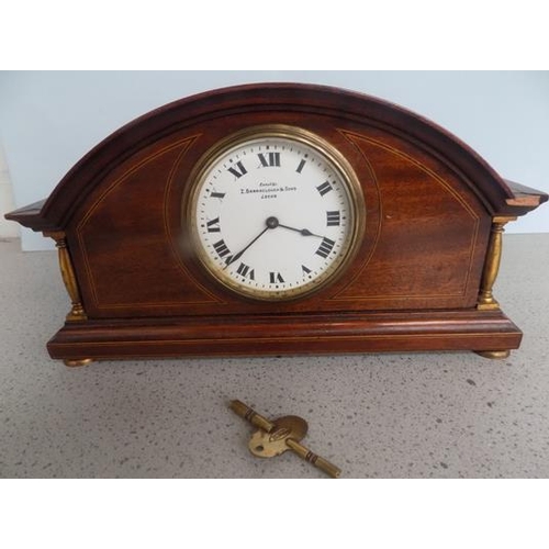 242 - Vintage 1940's mantle clock, inlaid marquetry, brass end columns, brass feet - 'Z Barraclough', used... 