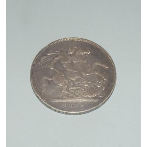 266 - A Queen Victoria silver crown dated 1889 with Victoria and George the Dragon Slayer