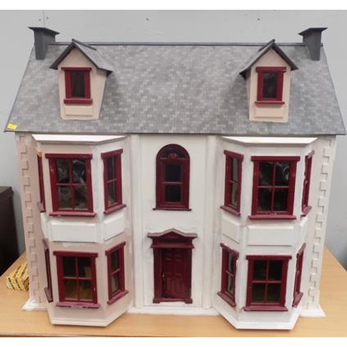 550a - Beautifully furnished large dolls house with large selection of furniture etc.