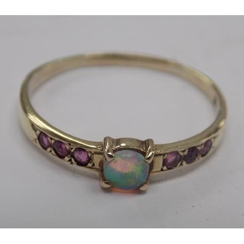 115 - 9ct Gold ruby & opal ring size M1/2