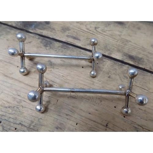 349 - Pair of solid silver knife rests, lovely condition