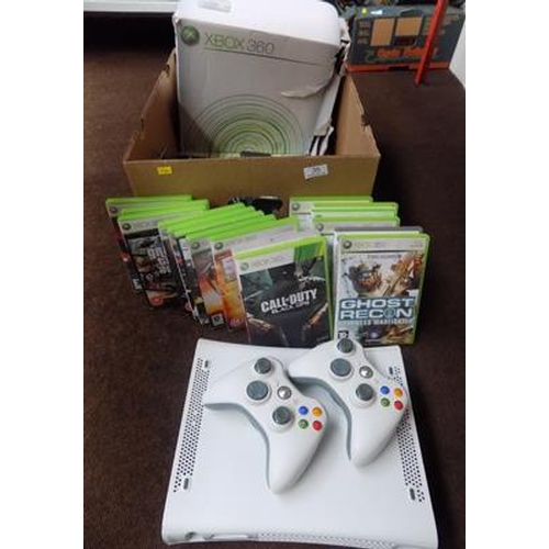 35 - XBox 360 with controllers in W/O + games