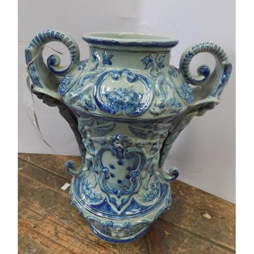 70 - Large double handled blue ornate vase, approx. 14 inches - slight damage found to cherub's feet