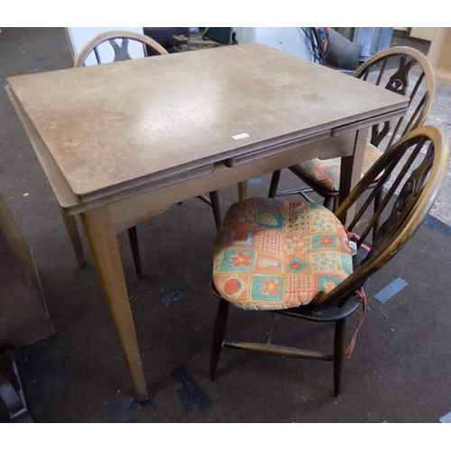 511 - Table + three Ercol chairs