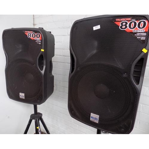 560 - Pair of Alto Truesonic series 800 watt speakers on stands - one needs attention