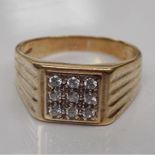 122 - 9ct Gold heavy gents signet ring with white stones size W 1/2