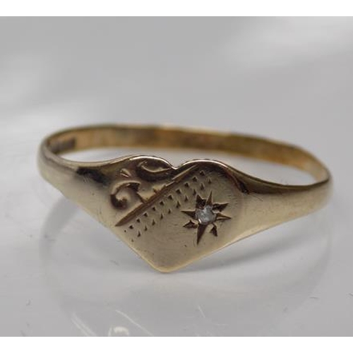 124 - 9ct Gold heart signet ring set with diamond size O 1/2