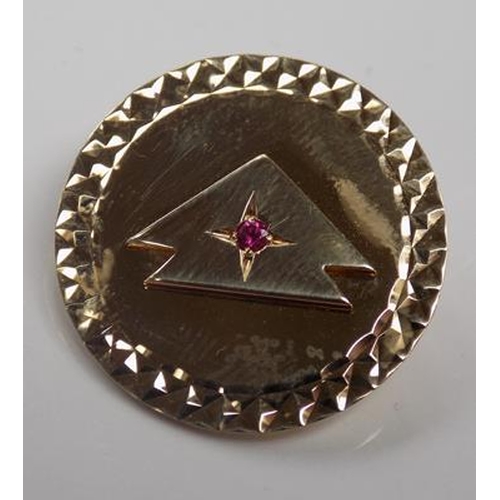 130 - 9ct Gold art deco style brooch set with ruby