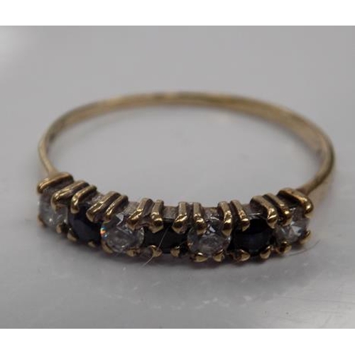 133 - 9ct Gold sapphire 1/4 eternity ring size N