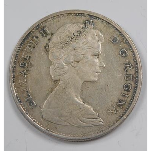 104 - 1965 Canadian silver dollar