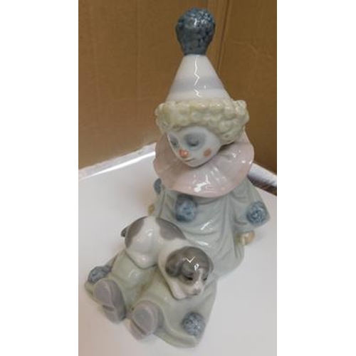 122 - Lladro young boy dressed as a clown with a dog approx 4