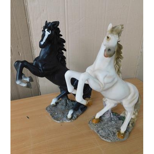 16a - Pair of ceramic rearing horses-no damage found approx 13