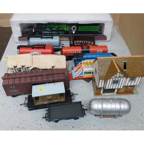 180 - Assortment of trains, carriages etc