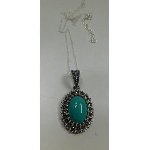 204 - Silver turquoise & marcasite pendant on silver chain