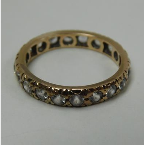 205 - 9ct Gold full eternity ring set with white stones size L1/2