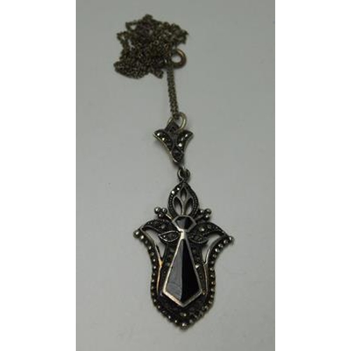 214 - 925 Silver jet & marcasite pendant on silver chain