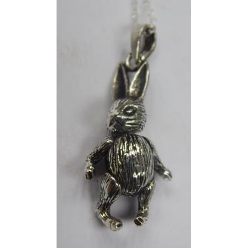 213 - Silver articulated hare pendant on silver chain