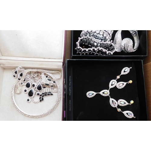 38 - Assortment of  boxed of 'Bling' costume jewellery