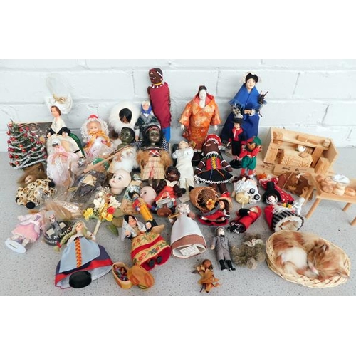 55 - Large collection of dolls from around the world