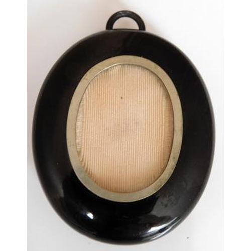 97 - Vintage miniature painted porcelain locket pendant, Bakelite casing on outer - approx. 2 inches