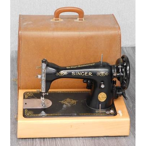 709 - Singer sewing machine (unchecked/as seen) needs power lead