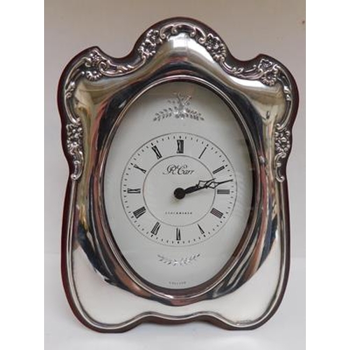 103 - R Carr silver teak mantle clock in working order